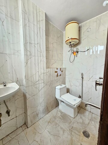 Bathroom in 2 BHK Builder Floor at Chattarpur – for Rent