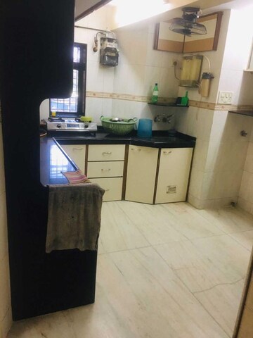 Kitchen in 2 BHK Apartment at Shrenik CHS, Panch Pakhadi – for Rent