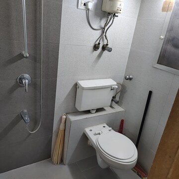 Bathroom in 2 BHK Apartment at Sandstone CHS Ltd, Mira Road – for Sale