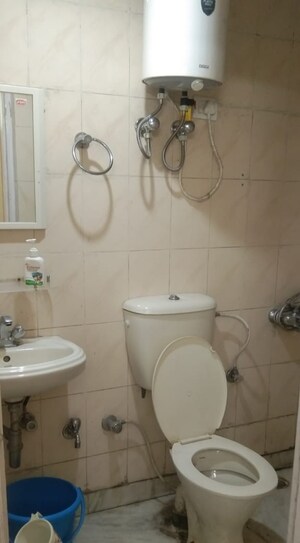 Bathroom in 3 BHK Apartment at Bharari – for Sale