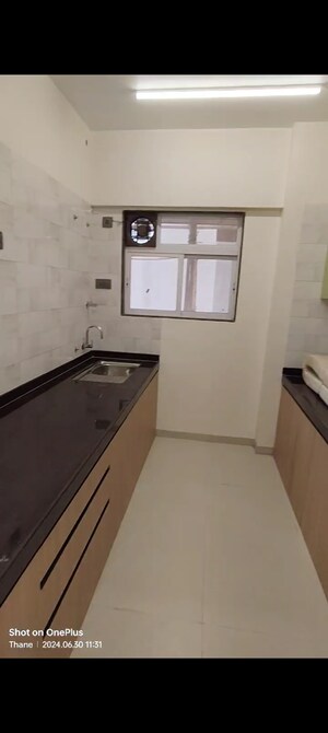 Kitchen in 2 BHK Apartment at Rajaram Shree Shankheshwar Ashish, Uthalsar – for Sale