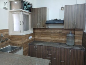 Kitchen in 3 BHK Builder Floor at Pochanpur Colony – for Sale