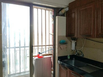 Kitchen in 2 BHK Apartment at Lodha Luxuria, Majiwada – for Sale