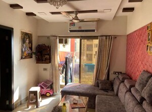 Living Room in 1 BHK Apartment at Palacia Kingston, Thane West – for Sale