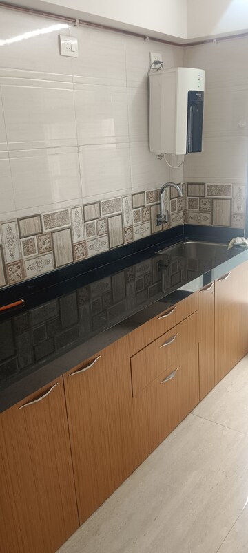 Kitchen in 1 BHK Apartment at Vrindavan ABC CHS, Malad East – for Rent