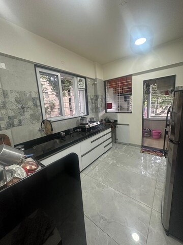 Kitchen in 2 BHK Apartment at Prashant Society, Paud Road – for Rent