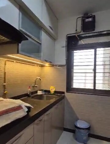 Kitchen in 3 BHK Apartment at Acme Ozone, Manpada – for Rent