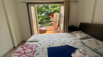 Bedroom in 2 BHK Apartment at Ganga Costel, Kharadi – for Sale