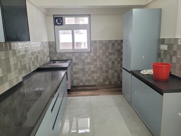 Kitchen in 2 BHK Apartment at D And T Mountain View CHS, Senapati Bapat Road – for Rent