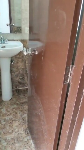 Bathroom in 2.5 BHK Apartment at Gaur City 2 – for Sale
