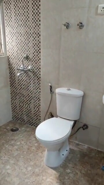 Bathroom in 2.5 BHK Apartment at Gaur City 2 – for Sale
