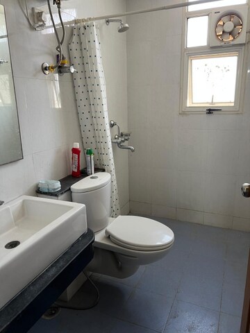 Bathroom in 3 BHK Apartment at AWHO Vijay Vihar, Wagholi – for Rent