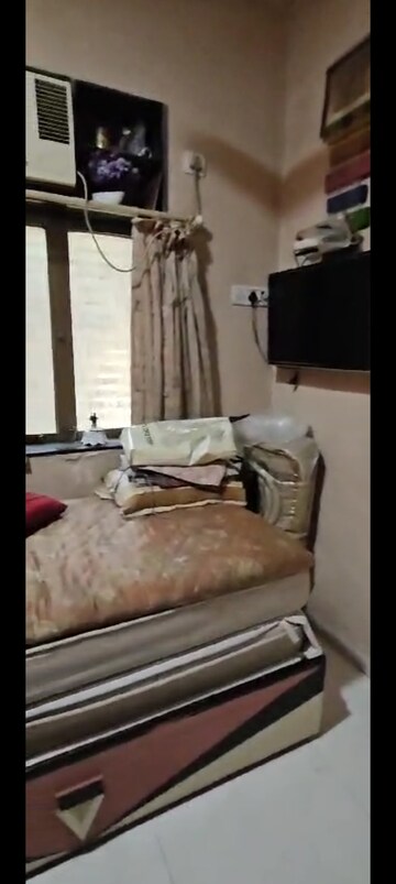 Bedroom in 2 BHK Apartment at Jainam CHS, Ghatkopar West – for Rent