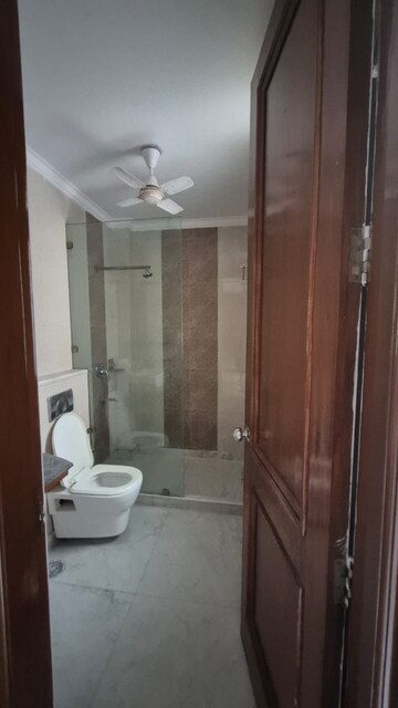 Bathroom in 3 BHK Builder Floor at DDA Taimoor Enclave, New Friends Colony – for Rent