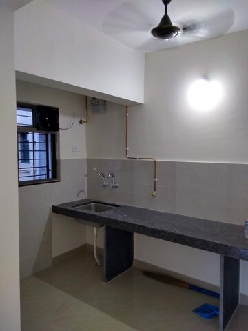 Kitchen in 1 BHK Apartment at Amit Colori Phase II, Undri – for Rent