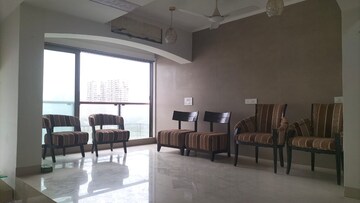 Living Room in 4 BHK Apartment at Transcon Auris Ivorine, Andheri West – for Rent
