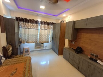 Living Room in 2 BHK Apartment at Hill Top CHS Borivali West, Borivali West – for Rent