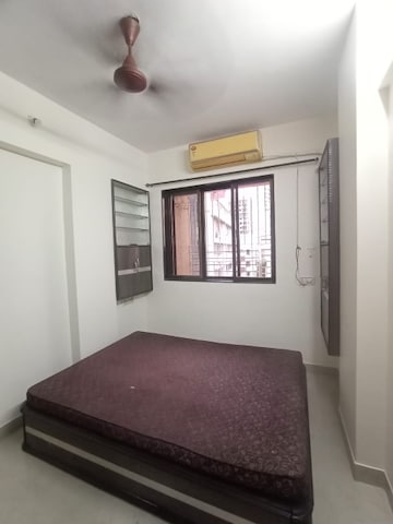 Bedroom in 2 BHK Apartment at Rupali CHS, Malad West – for Rent