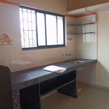 Kitchen in 2 BHK Apartment at Pimple Gurav – for Rent