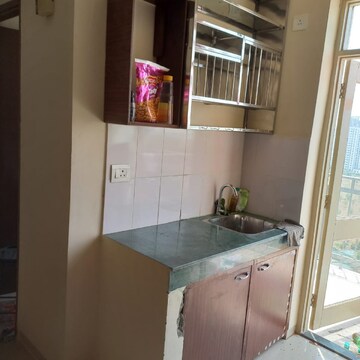 Kitchen in 2 BHK Apartment at Adani Aangan Arcade, Sector 88a – for Rent