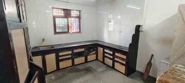 Kitchen in 2 BHK Apartment at Giriraj CHS Naupda, Naupada – for Rent