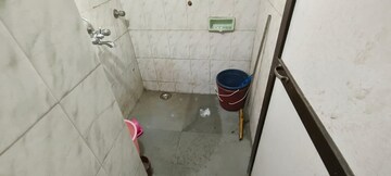Bathroom in 2 BHK Apartment at Giriraj CHS Naupda, Naupada – for Rent