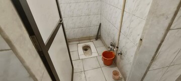 Bathroom in 2 BHK Apartment at Giriraj CHS Naupda, Naupada – for Rent