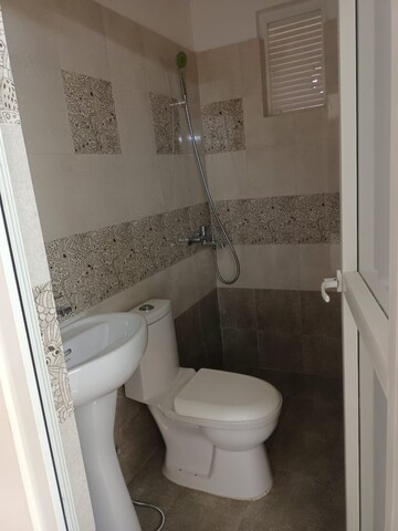 Bathroom in 2 BHK Apartment at Windlass River Valley, Harrawala – for Rent