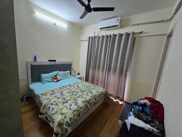 Bedroom in 2 BHK Apartment at Shapoorji Pallonji Alpine, Kandivali East – for Rent