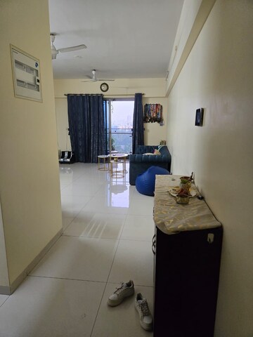 Living Room in 2 BHK Apartment at Shapoorji Pallonji Alpine, Kandivali East – for Rent