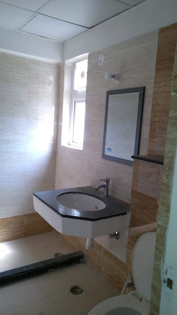 Bathroom in 3 BHK Apartment at Ramprastha Primera, Sector 37d – for Rent