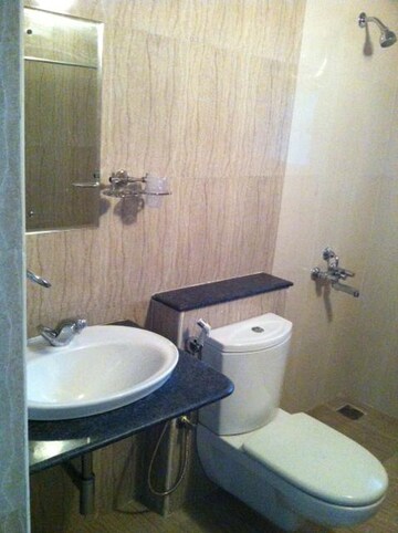 Bathroom in 3 BHK Apartment at Abodh Valmark, Hebbal – for Rent
