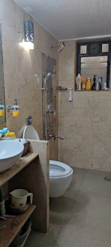 Bathroom in 3 BHK Apartment at Silver Arch Spring Co Operative Housing Society Ltd, Andheri West – for Sale