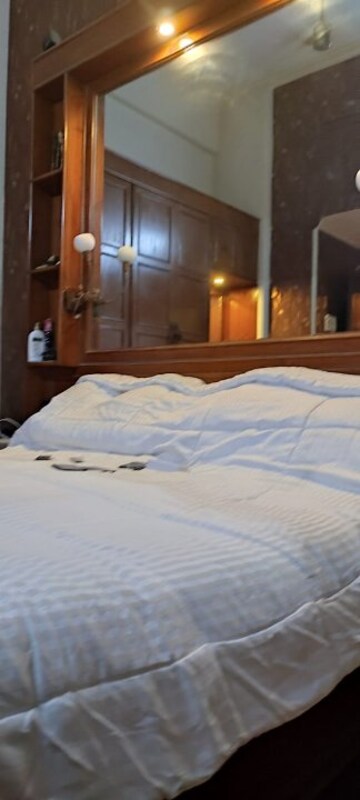 Bedroom in 3 BHK Apartment at Silver Arch Spring Co Operative Housing Society Ltd, Andheri West – for Sale