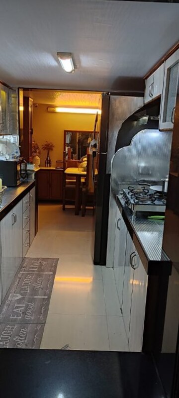 Kitchen in 3 BHK Apartment at Silver Arch Spring Co Operative Housing Society Ltd, Andheri West – for Sale