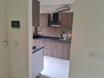 Kitchen in 4 BHK Apartment at Adani M2K Oyster Grande, Sector 102 – for Rent