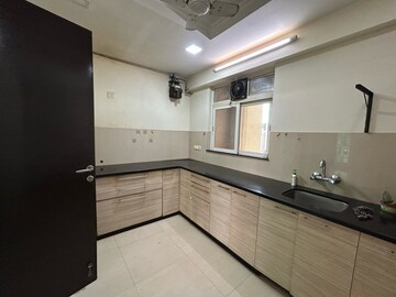 Kitchen in 4 BHK Apartment at Hiranandani Meadows, Manpada – for Rent