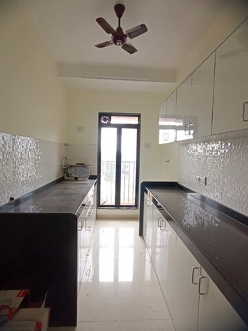 Kitchen in 1 BHK Apartment at Romell Serene, Borivali West – for Rent