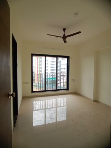 Room in 1 BHK Apartment at Romell Serene, Borivali West – for Rent