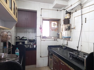 Kitchen in 1 BHK Apartment at Rutu Enclave, Kasarvadavali – for Rent