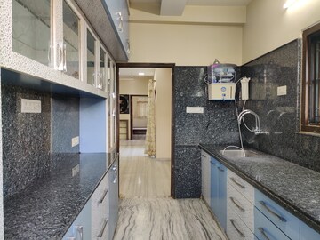 Kitchen in 3 BHK Apartment at Oxford Enclave, Shivaji Nagar – for Rent