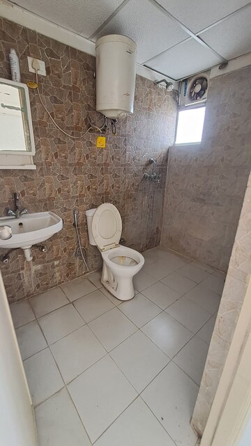 Bathroom in 2 BHK Apartment at Galaxy Royale, Gaur City 2 – for Rent