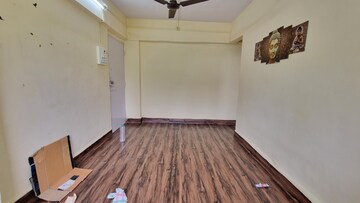 Living Room in 1 BHK Apartment at Rishikesh CHS, Malad West – for Rent