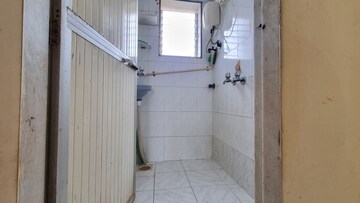 Bathroom in 1 BHK Apartment at Rishikesh CHS, Malad West – for Rent