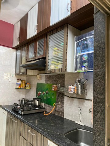 Kitchen in 2 BHK Apartment at Abhay Sheetal  Complex, Mira Road – for Sale
