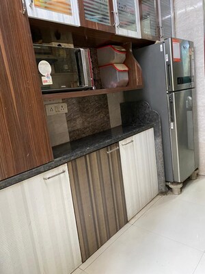Kitchen in 2 BHK Apartment at Abhay Sheetal  Complex, Mira Road – for Sale