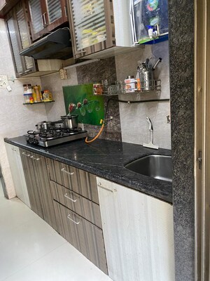 Kitchen in 2 BHK Apartment at Abhay Sheetal  Complex, Mira Road – for Sale
