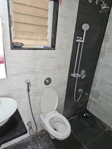 Bathroom in 3 BHK Apartment at Kolte Patil R10, Hinjewadi – for Rent