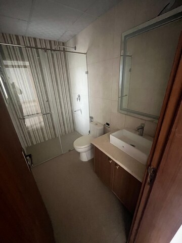 Bathroom in 3 BHK Apartment at Central Park Lake Front Towers, Sohna Sector 33 – for Rent