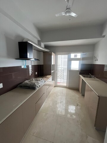 Kitchen in 3 BHK Apartment at Central Park Lake Front Towers, Sohna Sector 33 – for Rent